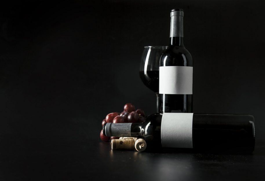 corks-grape-near-bottles-wineglass corks-grape-near-bottles-wineglass